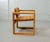 This minimalistic cubic armchair is made of solid pine. It was designed by Ate van Apeldoorn and produced in the 1970s....