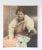 Vintage circa 1920's hand tinted portrait photograph of glamourous woman in lace and furs. Unsigned. Unframed, corner bumps.