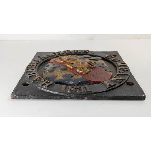 We are selling this 19th Cast Iron sign with Haberdasher’s emblem. This great painted sign from a building has central...