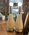 These are very cute matching boudoir glass table lamps with light yellow accents and flared skirt-like shades. Original...