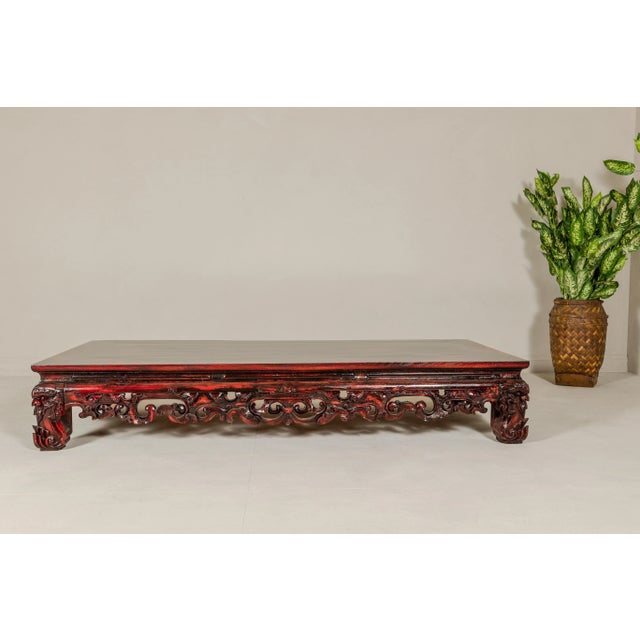 Asian Qing Dynasty Low Kang Coffee Table with Reddish Brown Finish and Carved Décor For Sale - Image 3 of 12