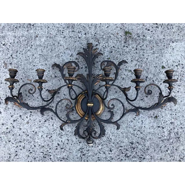 Italianate Tole and wood wall sconce. Gorgeous detailed scrolls and dramatic black and gold color. This beauty would add...