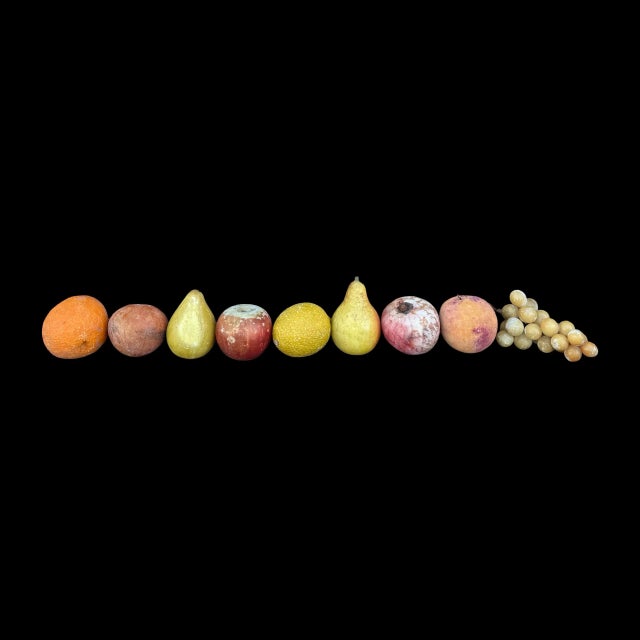 This assorted collection of 9 vintage Italian marble fruits is a striking example of mid-20th century craftsmanship from...