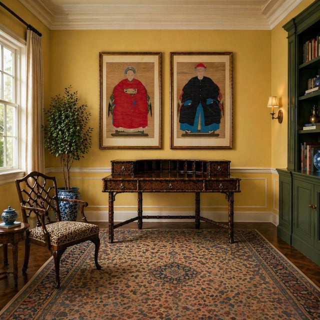 This is a lovely regency style carved faux bamboo and rattan desk with a tortoise lacquer finish. It has Carlton House...