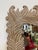 For your consideration: Extraordinary carved wood mirror with palm frond motif, some wear consistent with age. The wood...