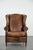 We are offering this warm, cozy, and comfortable vintage sheepskin wing chair with character. We believe that no interior...