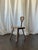 This charming vintage accent chair features a beautifully carved clover-shaped detail at the top, adding a distinctive...