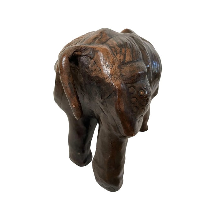 Mid century leather wrapped rhino sculpture. This guy has such an intelligent look in his eye. Beautifully configured. The...