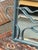 Design Plus Gallery presents a Postmodern Patinated Abstract Wave Wall Mirror. This rectangular mirror is framed in metal...