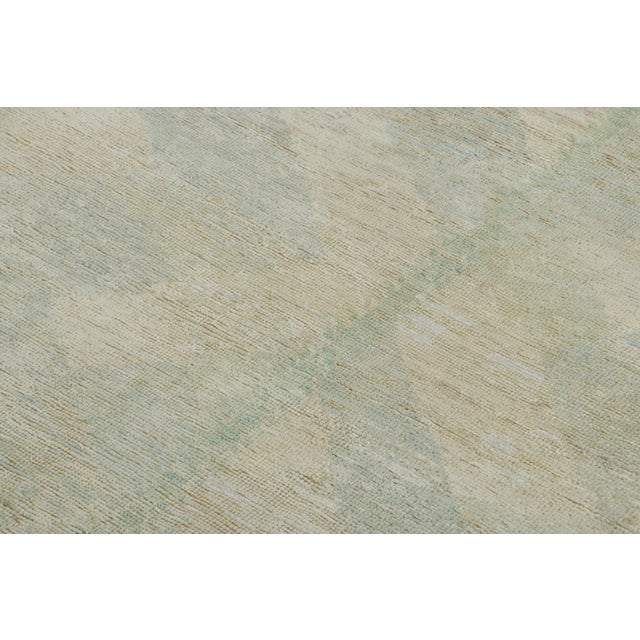 Made with a luxurious hand-knotted wool and silk pile, this 9x12 rug is an exceptional new addition to Rug & Kilim’s...