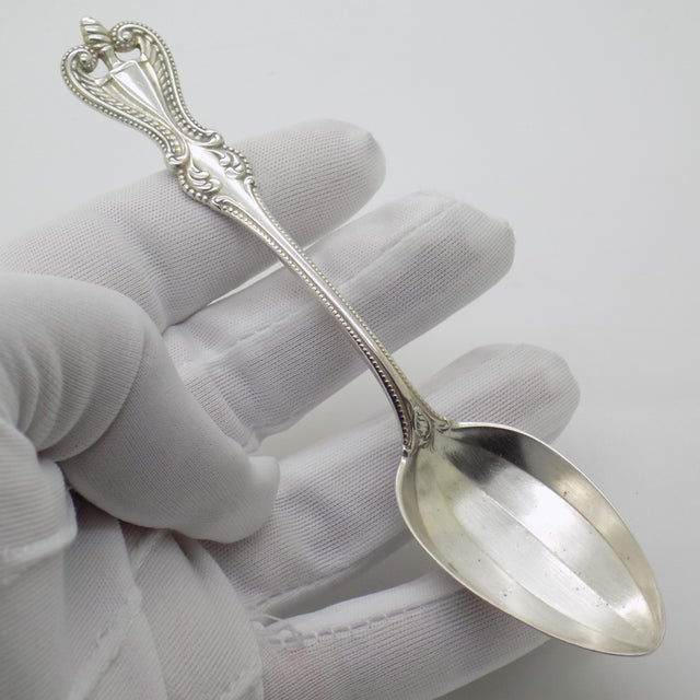 This elegant 5.4-inch spoon was handmade in the 1970s/1980s and stamped 925 (Sterling Silver / 925/000). Engraved with the...