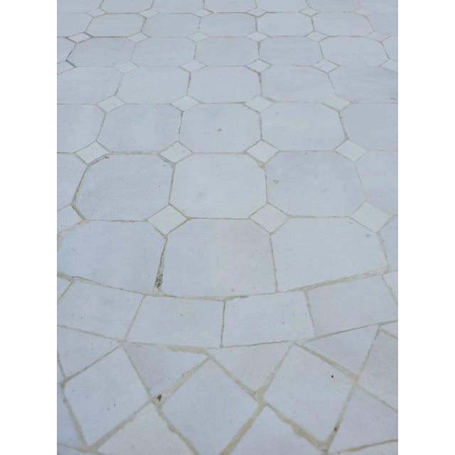 100 % glazed. Round Moroccan mosaic table measuring approximately 24" in diameter and 19" in height, with white tiles. For...