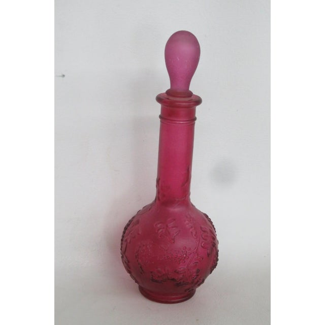 This lovely Empty Vanity Bottle is made of pressed glass. This bottle is marked on the bottle as being made by Avon, see...