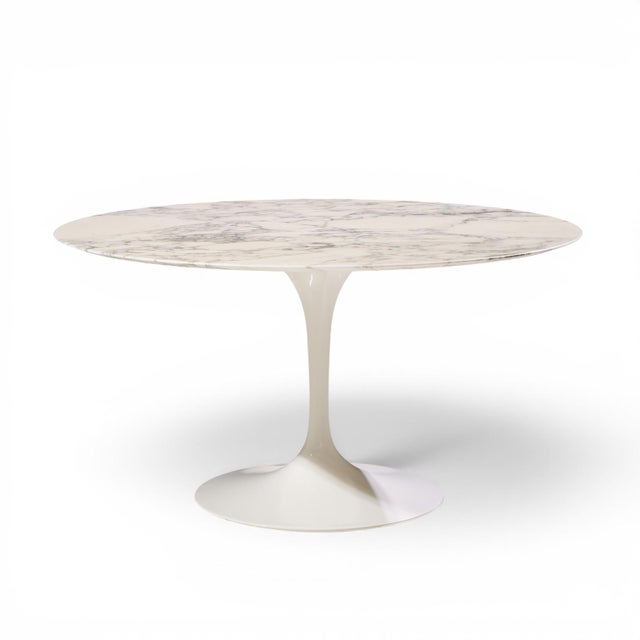 Eero Saarinen for Knoll Mid Century 54" Tulip Carrara Marble Dining Table This dining table measures: 54 wide x 54 deep x...