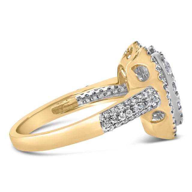 Immerse yourself in the timeless elegance of this exquisite 14K yellow gold ring, where a heart-shaped constellation of...