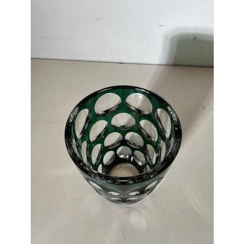 Stunning Val Saint Lambert crystal vase in a rich emerald green overlay with expertly cut circular facets. The deep color...