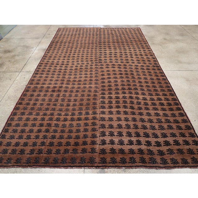 A vintage Turkish Anatolian room size carpet handmade during the Mid-20th century. Measures: 8' 8" x 14' 8"