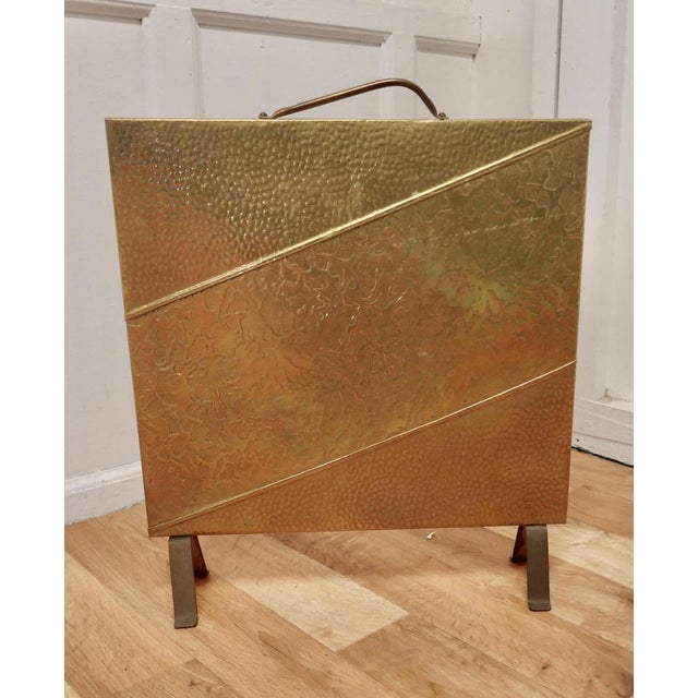 Stylish Art Deco beaten brass fire screen This is a charming and stylish screen, the screen it has diagonal design to the...