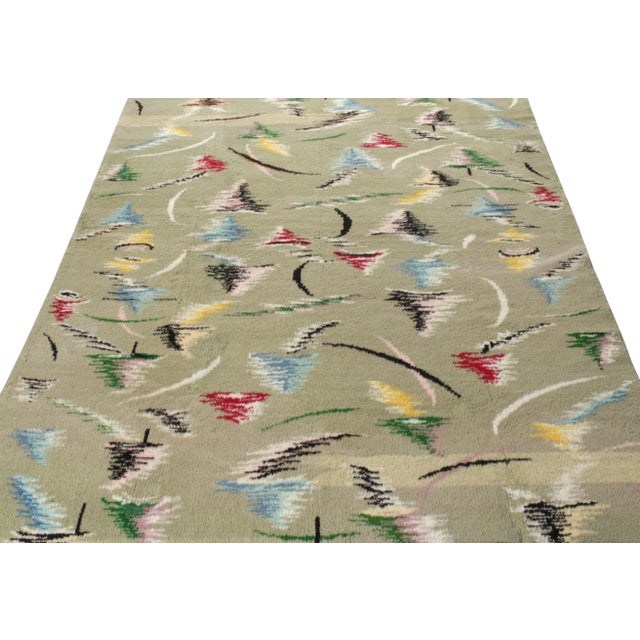 Hand-knotted in wool, a vintage 6x10 Art Deco rug selection from Turkish designer Zeki Muren, entering Rug & Kilim’s...