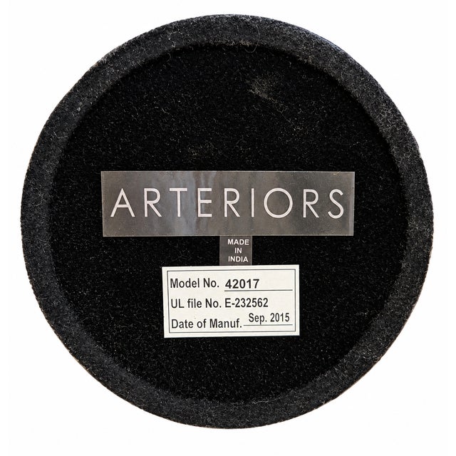 Sculptural Narsi table lamp by Arteriors, Model 42017-928, manufactured in September 2015. Crafted of substantial cast...