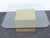 This Coffee Table is made out of metal, and glass. This Table has Mid Century style and design, square metal base, brass...