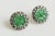 This is part of Chairish’s Fine Jewelry assortment. These lovely pierced vintage sterling silver and carved jade earrings...