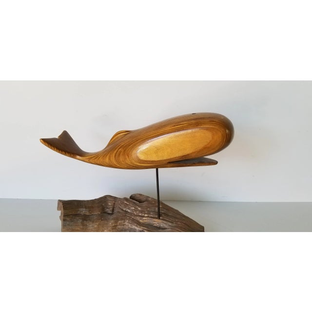 Available for sale this stunning Vintage Art hand-carved wood whale sculpture mounted on a Rustic Wood Base. Boasts vivid...