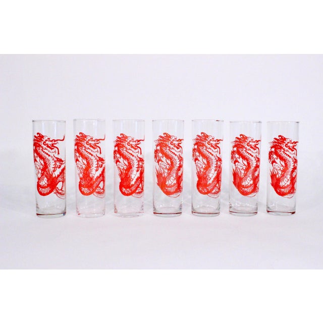 Very unique set of seven slim collins glasses with red dragon motif. 1970's vintage and in excellent cosmetic condition....