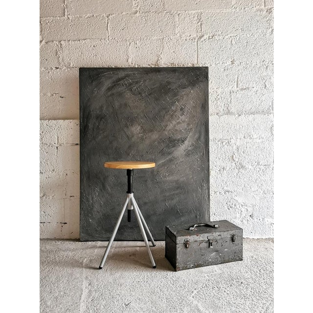 This rare metal tool box dates from the 1920s and was made in Germany. Painted gray on the outside and olive on the...