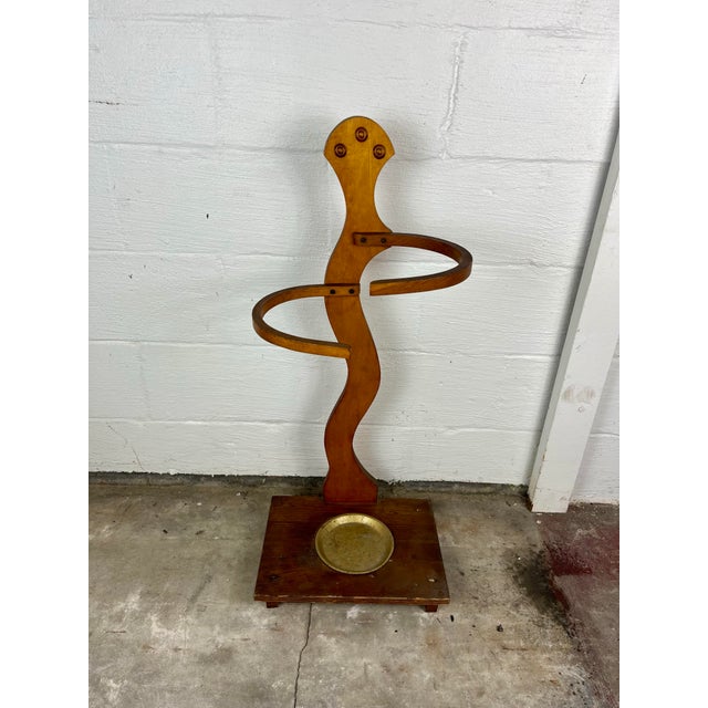 Unique mid century bentwood umbrella or stick stand. Great design with a personal feel. Bentwood representing arms. In a...