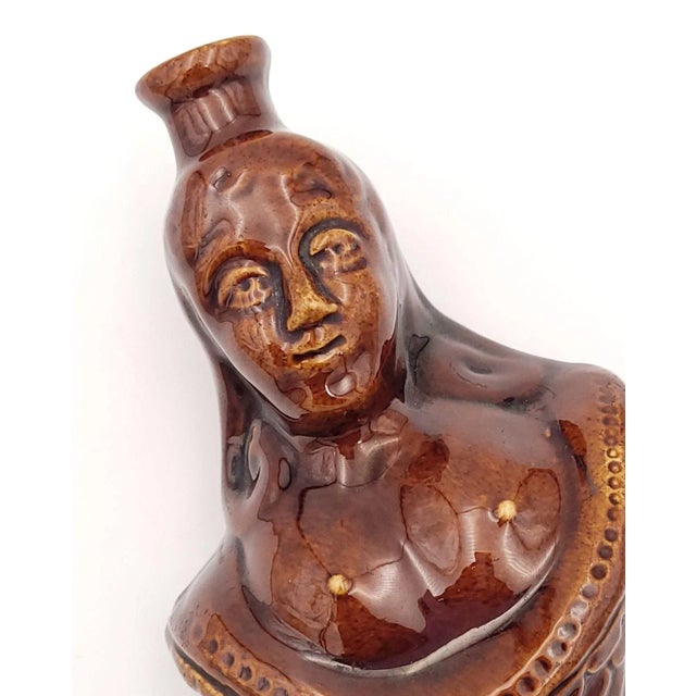 A rare Bennington mermaid flask, England circa 1840.