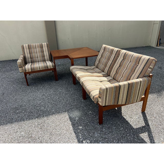 This lovely Danish sofa and arm set by France and Sons, John Stuart is modest in design but bursting with charm that will...