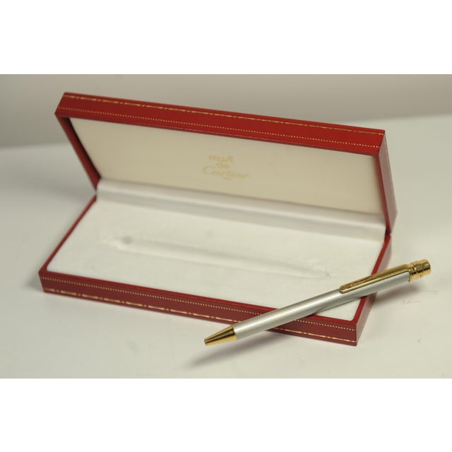 Santos Brushed Steel and 18 Karat Gold-Plated Stylo Bille Must II Ballpoint Pen with Red Box from Cartier, 2000s, Set of 3 For Sale - Image 3 of 15