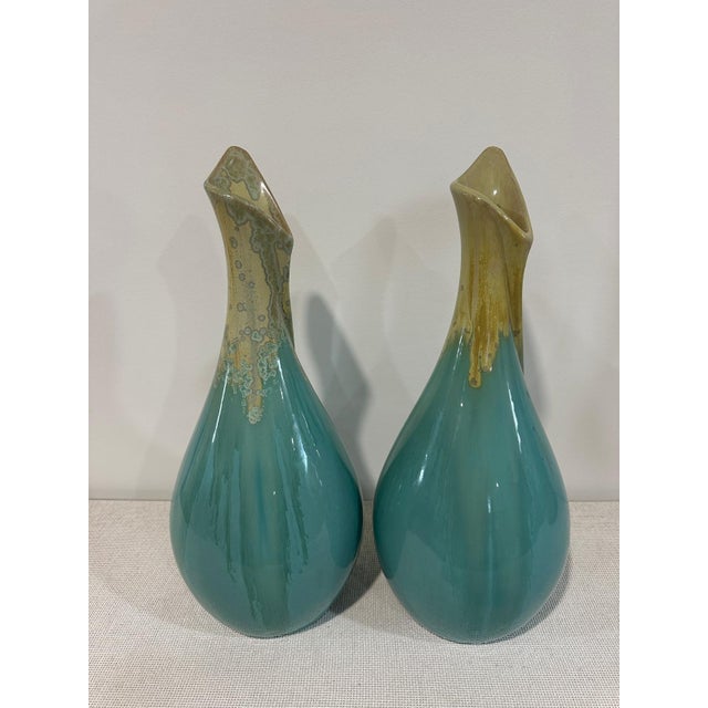 2 mid-century modern 1970s turquoise blue and moss green glazed pottery vases. Unusual petal shape. Handmade. No chips or...