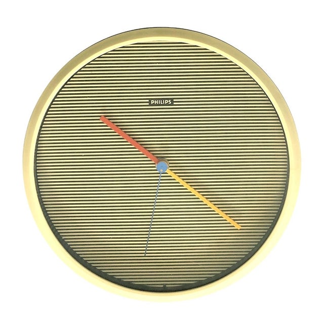 Vintage Wall Clock from Philips, 1970s, in Flawless conditions. Designed 1970 to 1979 This piece has an attribution mark,...
