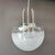 Large Mazzega Space Age style chandelier, 1960s design. Chromed steel structure and white speckled Murano glass semi-...