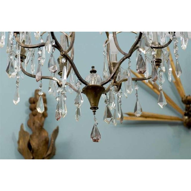 A Swedish eight-light vintage crystal chandelier from the mid 20th century. This Swedish crystal chandelier is going to...