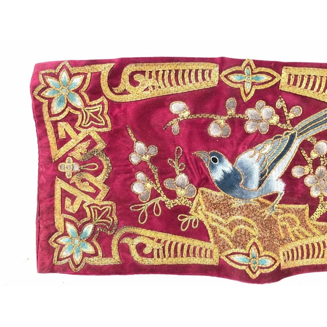 It was a challenge to capture the true colors of the piece. I can only describe them as a rich burgundy with muted lighter...