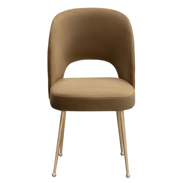 The Swell dining chair offers the perfect blend of Mid Century Modern and Hollywood Glam. With sumptuous velvet upholstery...