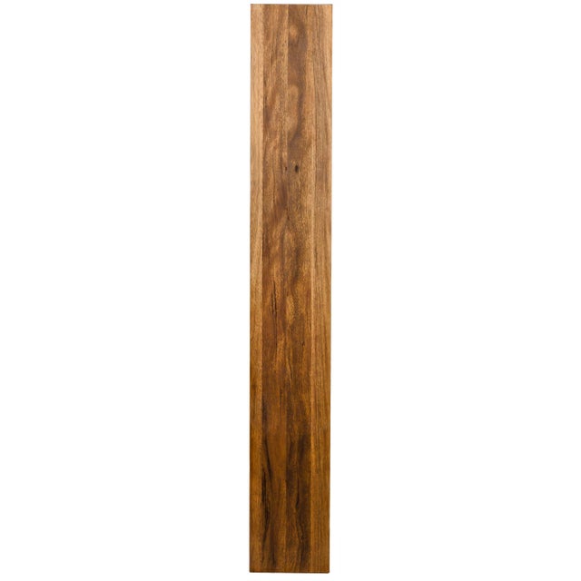 Beautifully finished walnut shelves and cubbies offer unique storage and display options in the striking Malic bookshelf...