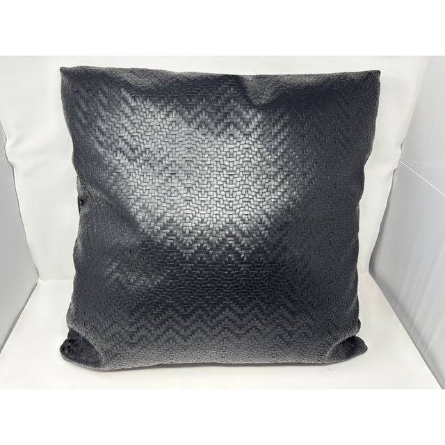 This is a stunning brand new throw pillow made with a black faux leather that has a woven texture. It features a down...
