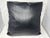 This is a stunning brand new throw pillow made with a black faux leather that has a woven texture. It features a down...