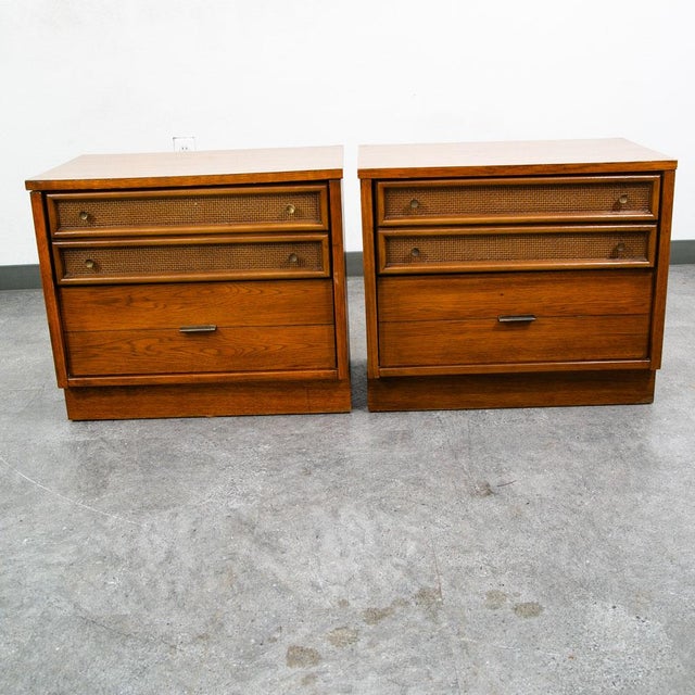 An outstanding pair of oak nightstands / end tables with 2 drawers by Founders. High quality and well made set. A great...
