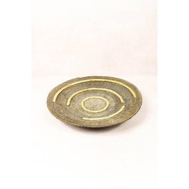 Makenge basket add a touch of artistry and sustainability to your home with the makenge basket . Handwoven by skilled...