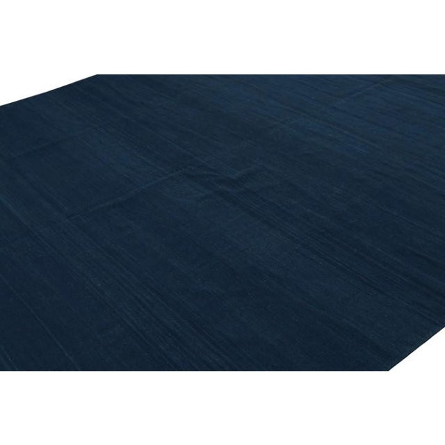 Made with handwoven cotton, this contemporary 9x11 Dhurrie flat weave is an exciting new entry in Rug & Kilim’s esteemed...