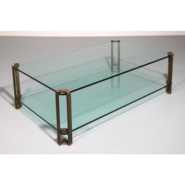 Step back into the 1970s with the exquisite Vintage Glass Coffee Table, designed by renowned Hungarian designer Peter...