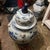 Striking large blue and white porcelain temple jar featuring detailed dragon motifs, decorative Chinese-style script, and...