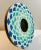 Vintage small round, art deco style, tabletop picture frame attributed to Jonathon Adler. Decorated with a blue and white...