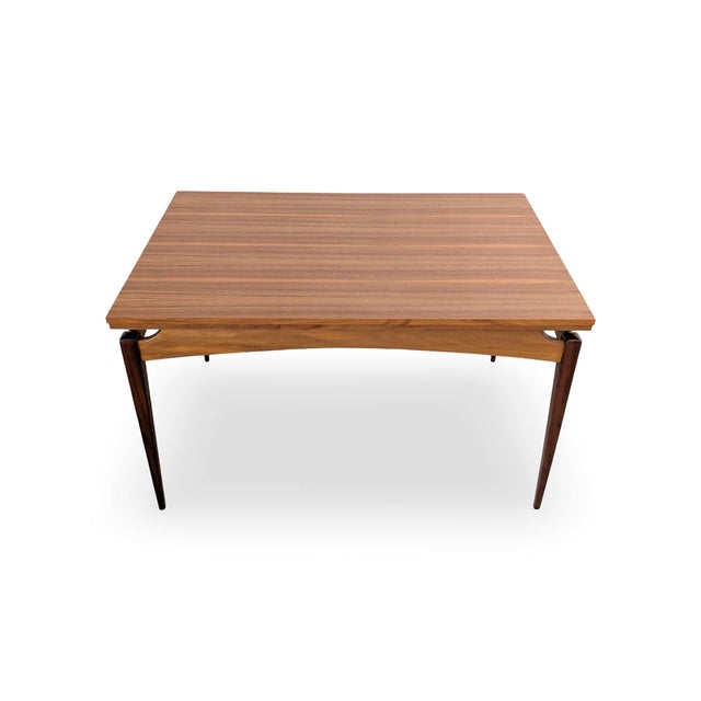 In the 1960s, tables began to be built to grow with the user – without bulky extensions, but with elegant mechanisms...