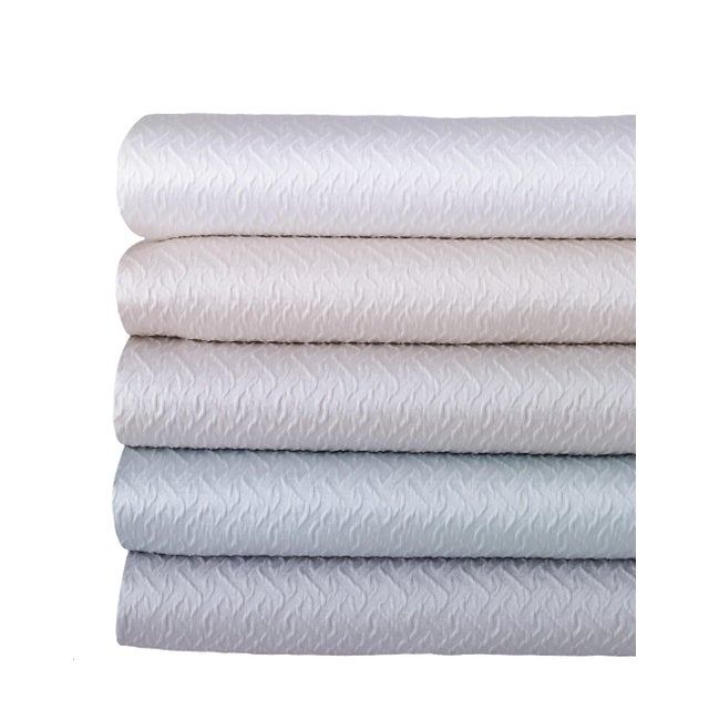 *Please note, this listing is for a coverlet only. With subtle patterning and a luminous sheen, we like to think of Tagami...